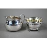 A Regency Irish silver open salt, the egg and dart moulded rim with chased foliate and shell