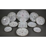 A Meissen porcelain part service, comprising 30 cm dish, three 25 cm plates, four 21 cm plates and