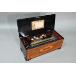 A 19th century Swiss inlaid rosewood cased cylinder music box, the 44 cm cylinder playing twelve