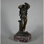 A classical brown bronze sculpture of a woman against a ruin fragment, on marble base, 31 cm h to/