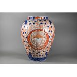 A 19th century Japanese Imari lobed ovoid vase, Meiji period (1868-1912) painted with floral designs