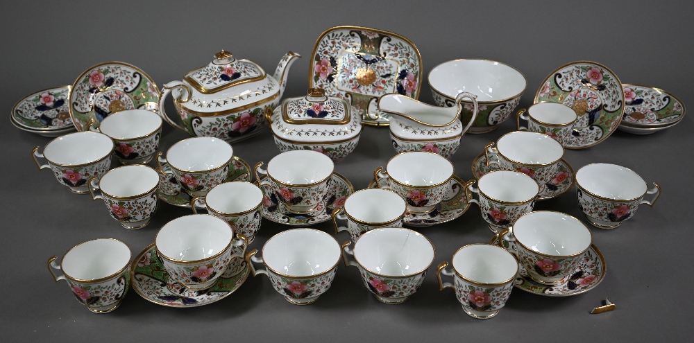 An early 19th century Swansea china part tea service, painted and gilded with floral design,