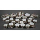 An early 19th century Swansea china part tea service, painted and gilded with floral design,