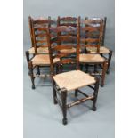 A set of six Lancashire oak framed rope seat chairs, with wavy ladder backs (6)