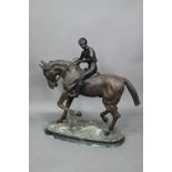 After Pierre Jules Menes, a patinated bronze sculpture of a mounted jockey, raised on a naturalistic