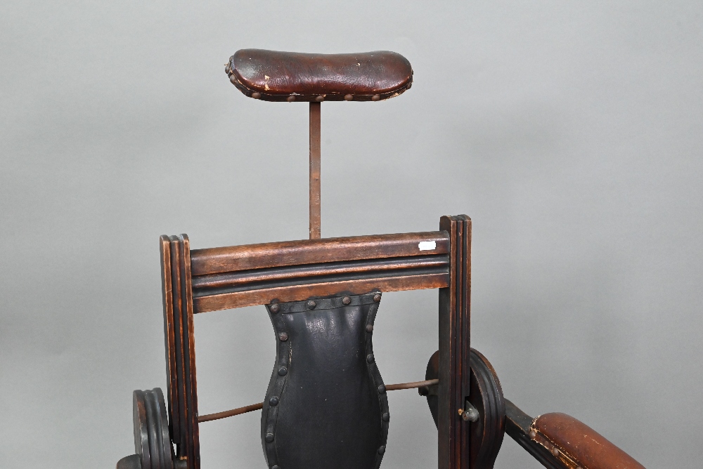 An early 20th century barber's chair, bears makers plate for J W Clarke, Borough, London - Image 3 of 8