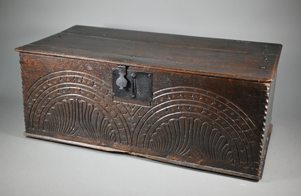 A late 17th century bible box with lunette carved front, 70 cm x 36 cm x 26.5 cm h