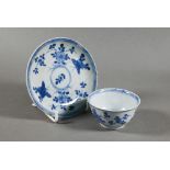 An 18th century Chinese Ca Mau shipwreck porcelain tea bowl and saucer, painted in underglaze blue