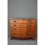 A good quality Georgian style cross-banded mahogany bowfront chest of four long graduated drawers,