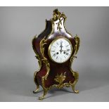 A 19th century gilt-metal mounted tortoiseshell mantel clock, the two train eight-day movement
