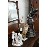 A Sitzendorf group of putti to/w a resin falcon and Spelter figure of Industry after Augustus Moreau