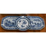 A pair of 19th century Chinese blue and white dishes, painted with ornamental lake landscapes, 31