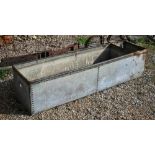 A vintage galvanised cattle trough / planter, 187 x 48 x 420 cm h