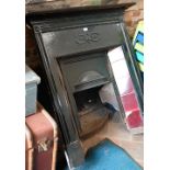 Cast iron fireplace with tiled slip - incomplete as removed to/w a traditional cast iron fireback,