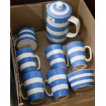 A Cornish ware coffee pot, with milk and sugar pair and five mugs