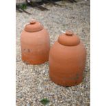 A pair of traditional terracotta rhubarb forcers and caps (2)