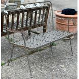 A weathered steel garden bench a/f