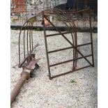 An antique cast and wrought iron three-piece 'kissing gate', as removed, stored and found