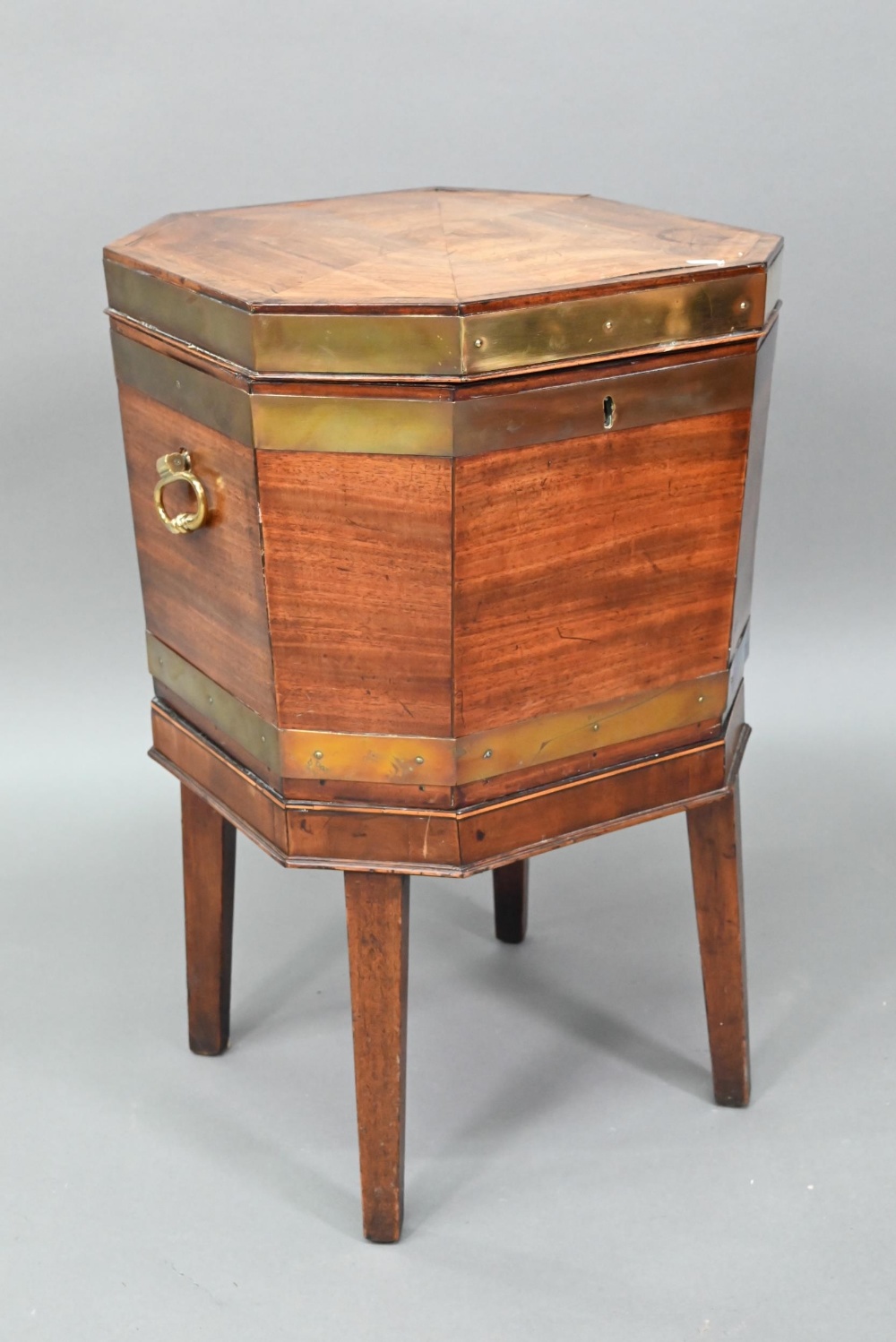 A George III brass bound mahogany wine cooler of octagonal form, with internal zinc liner, raised on - Image 2 of 6