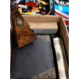 A Victorian leather-bound photograph album with brass mounts, lithographic-decorated pages and