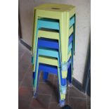A stack of seven 'Marquee' brand powder coated steel stacking stools, various colours (7)