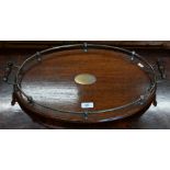 An antique silver plate mounted oval oak twin handled tray, 55 x 37 cm