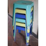 A stack of six 'Marquee' brand powder coated steel stacking stools, various colours (6)