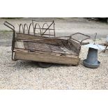 A vintage Geest wooden-bodied, drop-side, garden truck to/w a pair of saddle racks, a wrought iron