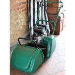 An Allett Classic 14L cylinder petrol mower c/w inter-changeable scarifier attachment, tools and