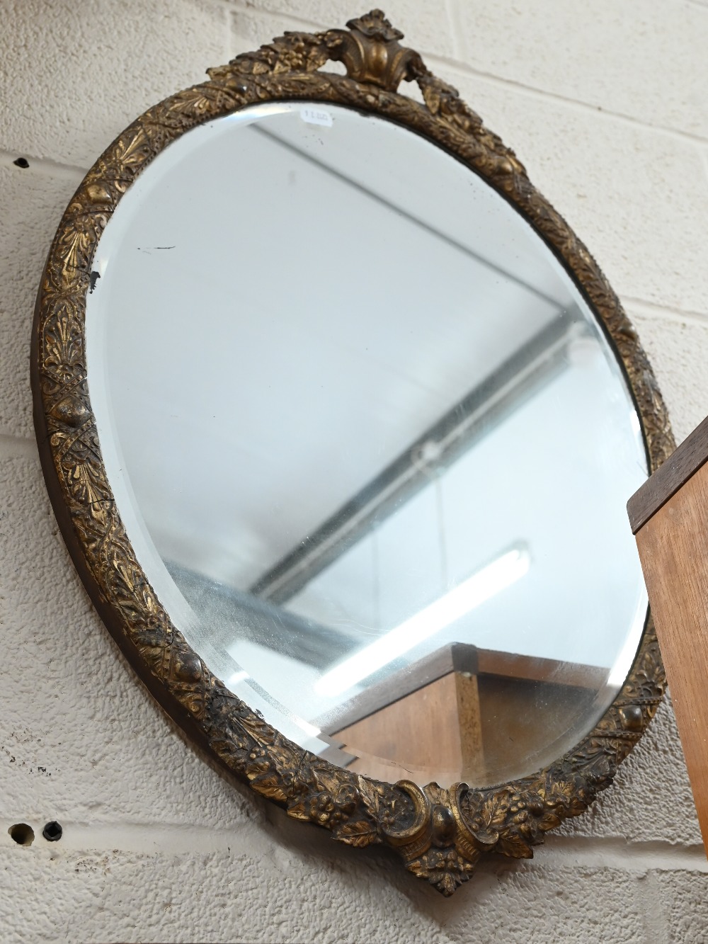 A bevelled oval wall mirror in decorative gilt frame, 45 cm wide x 64 cm high to/w rectangular - Image 2 of 4