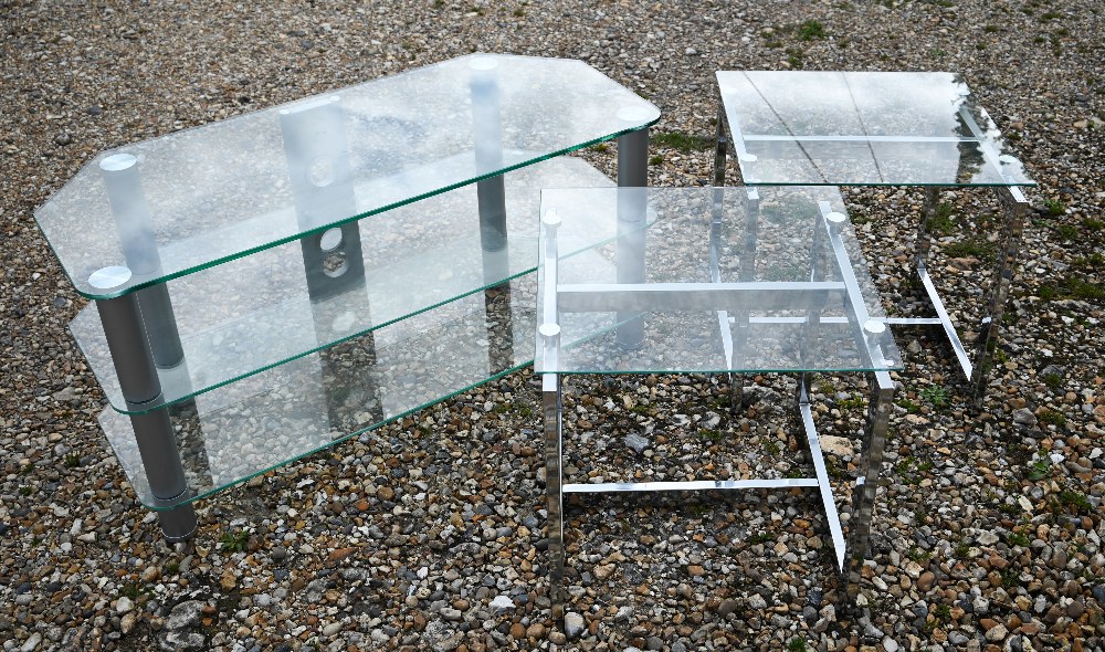 A modern glass TV table/counter to/with a pair of glass top chrome framed tables (3)