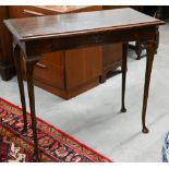 An Edwardian hall table with single frieze drawer on cabriole supports, stained finish, 90 x 44 x 80