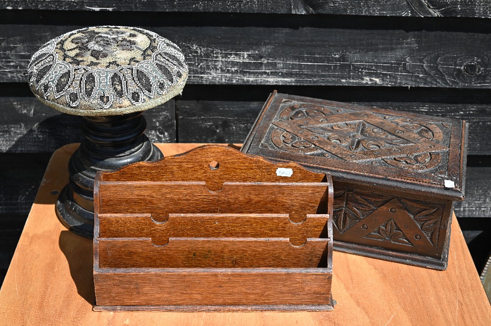 A Victorian beaded stool on turned base to/w a stationery rack and a carved oak box (3)