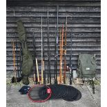 Various coarse and sea fishing rods, 2 with fixed spool reels, with sleeves and rod-bag