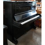 C. Bechstein ebonised upright piano with ivory keys, frame number 81110, case numbered 13135 with