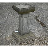 A weathered cast stone pedestal birdbath, 58 cm h