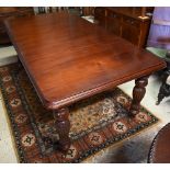 A Regency style mahogany extending dining table with single wide leaf raised on bobbin reeded turned