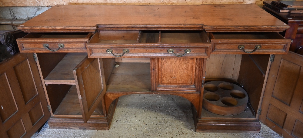 Howard & Sons, Berners St, London, a late 19th century golden oak inverted breakfront sideboard ( - Image 4 of 9