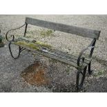 A weathered wood slat and wrought iron framed garden bench, 166 cm w - a/f