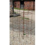 A trio of weathered steel arrowhead obelisks (3)