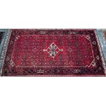 An old Persian Hamadan kelleh carpet, the red ground with geometric garden design, 270 cm x 150 cm