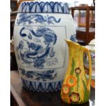 Asian blue and white ceramic barrel-shaped garden seat printed with dragons, 46 cm high to/w a