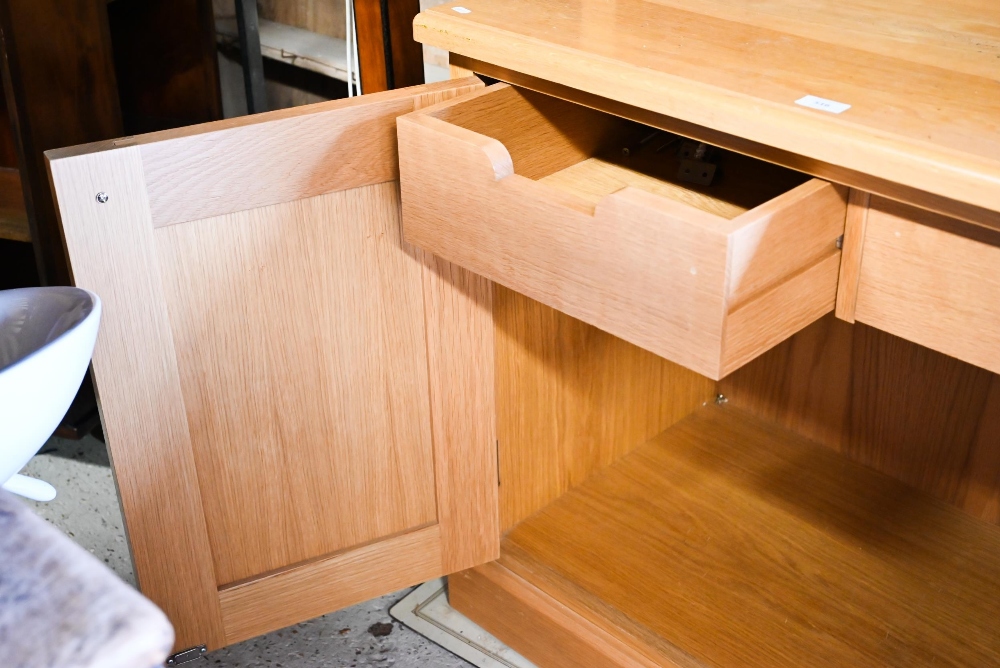 A modern oak cabinet bookcase with three adjustable shelves over base with panelled cupboard, 95 x - Image 3 of 3