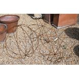 A trio of weathered steel garden spheres (3)