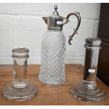A pressed glass claret jug with ep mounts to/w two Art Deco moulded glass display pillars (3)