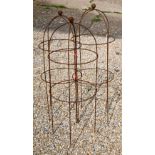 A trio of weathered steel ball head obelisks (3)