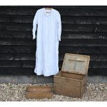 An oriental wicker hamper with fitted innter tray to/w an antique embroidered nightshirt