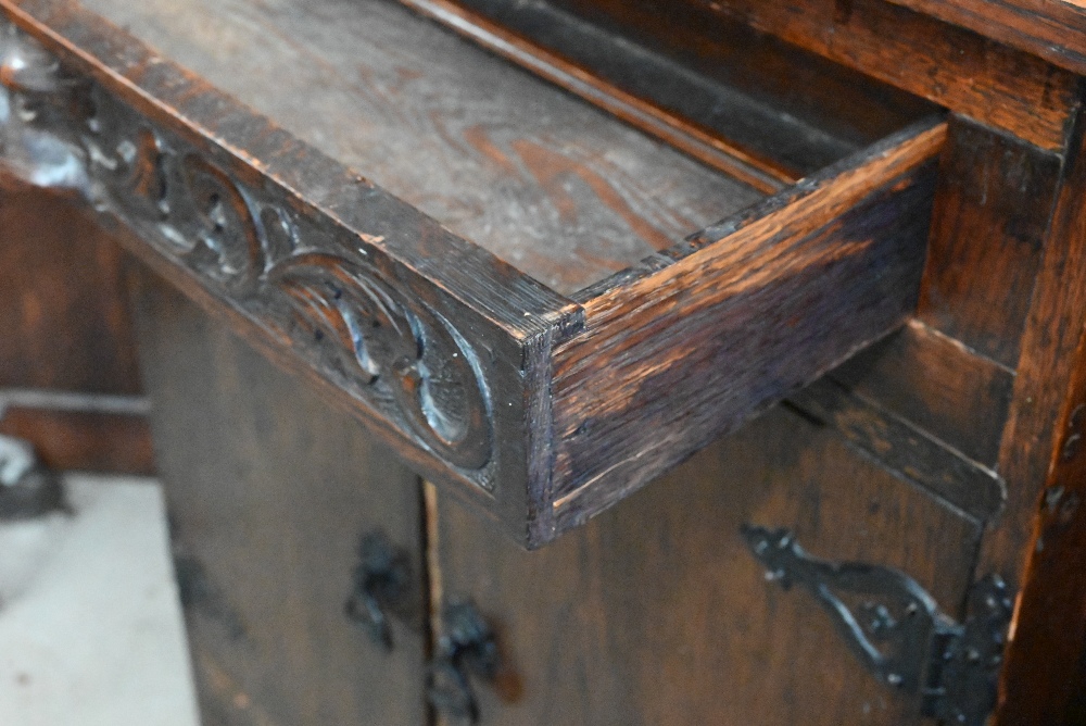 A small carved oak dresser, 80 cm wide x 40 cm deep x 190 cm high - Image 5 of 5