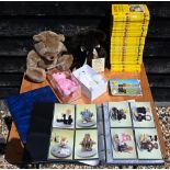 Four teddy bears, 29 Rupert Little Bear Library stories and an album of teddy bear-themed