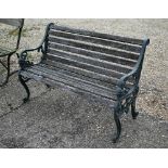 A weathered wood slat Victorian style garden bench with alloy frame, 126 cm w
